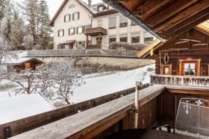 a winter view from the balcony of a house at Ferienwohnung Reintal in Grainau