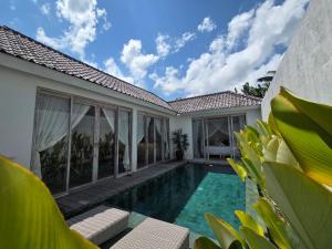 an image of a villa with a swimming pool at BoBos Villa Echo in Canggu