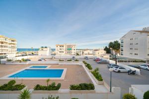 a view of a parking lot with a swimming pool at Casa Altea-mar in Altea