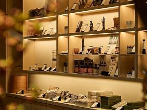 a display case in a store filled with lots of products at Fufu Kyoto in Kyoto