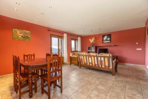 a dining room with a table and chairs at Milano in Campo +17 photos