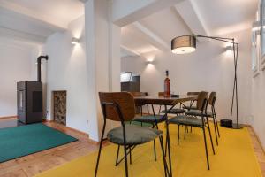 a dining room with a table and chairs at Ferienhaus Bergmann mit Sauna in Wildemann