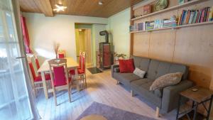 a living room with a couch and a table at Schwarzwaldferienwohnung Oberle in Todtnau