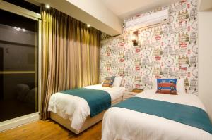 Postel nebo postele na pokoji v ubytování Successful 168 B&B