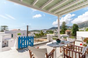 a view from the balcony of a villa with a table and chairs at Penny 's House in Artemonas