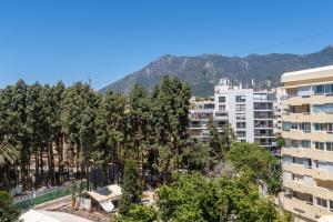 a view of a city with trees and buildings at Apartment with Swimming-pool in Marbella