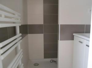 a bathroom with a sink and a toilet in it at Maison du centre - ruelle calme in La Tranche-sur-Mer