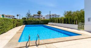a swimming pool in the backyard of a house at Francisca in Pollença