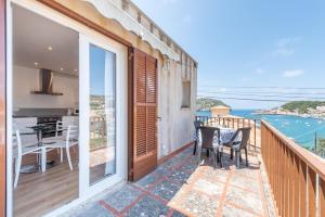a balcony with a view of the ocean at The Olives in Port de Soller