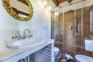 a bathroom with a sink and a shower at Tenuta Ca' Zen - Cottage Casetta in Taglio di Po +18 photos
