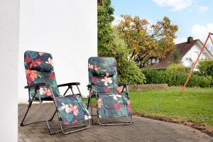 two chairs sitting next to each other on a patio at Agricola in Bad Säckingen