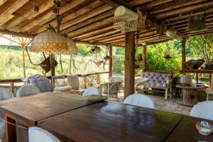 a dining room with a wooden table and chairs at Beb 1416 in Anghiari