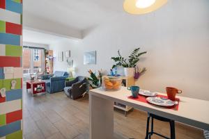 a living room with a table with food on it at Apartamento Caepionis in Chipiona