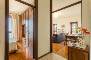 a room with a door leading to a bedroom at Attico Panoramico in Brunate