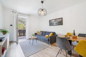 a living room with a couch and a table at Appartment Riffl Anna in Rifiano
