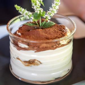 a dessert jar with a plant on top of it at Appartment Riffl Anna in Rifiano
