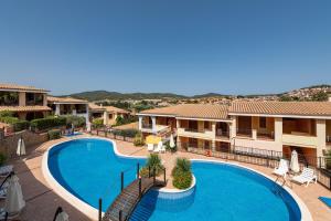 a view of a swimming pool at a resort at Residenza del Sole 1 in Villasimius