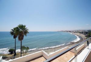 a view of the beach from a balcony at Apartment Boulevard 105 in Estepona