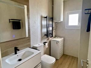 a bathroom with a sink and a toilet at Sea view avocado Finca Ten Days in La Orotava +127 photos