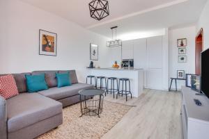 a living room with a couch and a table at Casa Ann in Arrecife