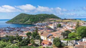an aerial view of a town next to the ocean at Casa das Cales in Angra do Heroísmo