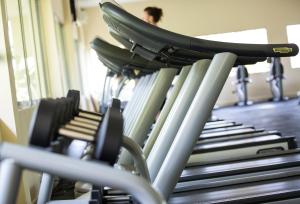 a row of treadles on a treadmill in a gym at Sokha Beach Resort in Sihanoukville