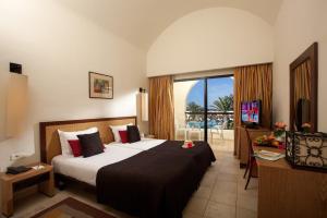 TV a/nebo společenská místnost v ubytování Sentido Djerba Beach