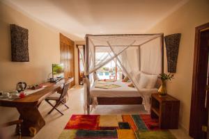 Uma área de estar em Fruit & Spice Wellness Resort Zanzibar