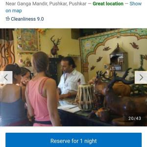 a screenshot of a video of a man and two women at Hom stay moon light Pushkar in Pushkar