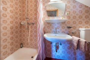 a bathroom with a sink and a shower at Urthalerhof Historic in Valdaora +26 photos
