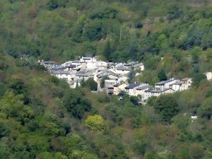 a group of houses on the side of a hill at Maison du Pâtre in Urbanya