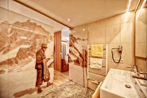 Koupelna v ubytování Hotel Arnika