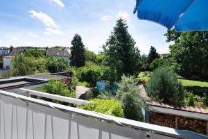 a view of a garden from the roof of a house at Ferienwohnung Bachem mit Balkon in Bad Neuenahr-Ahrweiler