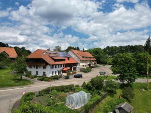 an aerial view of a house and a street at Haus Schlageter in Dachsberg im Schwarzwald