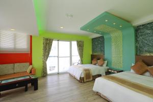 Un pat sau paturi într-o cameră la Hang Hai B&B