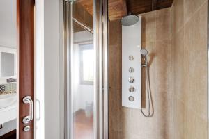 a shower in a bathroom with a glass door at El Portillo 2 in Buenavista del Norte +18 photos