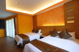 Voodi või voodid majutusasutuse Hang Hai B&B toas