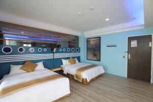 Giường trong phòng chung tại Hang Hai B&B