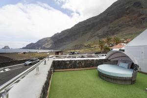 a room with a view of a mountain at Apartamentos Puntagrande in Frontera