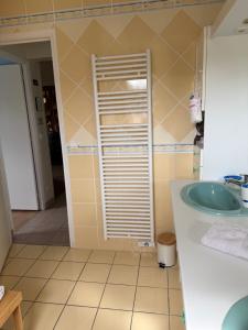 a bathroom with a sink and a mirror at Les Buissons in Saint-Pierre-le-Vieux +26 photos