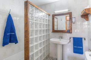 a bathroom with a sink and a mirror at Andres House, Tías in Tías +22 photos