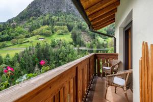 a balcony with a view of a mountain at Weirerhof Lebm Gspiarn in Barbiano