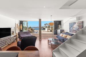 a living room with a view of the ocean at Dúplex Paradise above the sea in Benalmádena