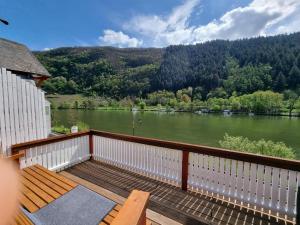 a balcony with a view of a river at Traum-Fewo Mosel-Panoramablick in Traben-Trarbach