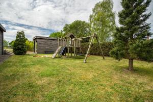 a playground in the yard of a house at Nova Ferienhaus, 50qm in Ueckermünde
