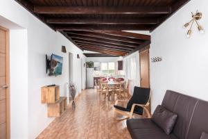 a living room with a couch and a table at Villa Ralue in Tuineje