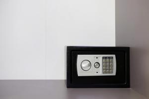 a black and white object is attached to a wall at Villa Dionysia Studio S6 in Alikanas