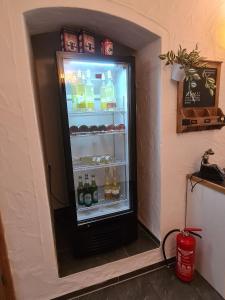 a refrigerator filled with lots of drinks at Haus Waldstein Kraxler Single in Weißenstadt