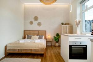 a bedroom with a bed and a fireplace at Sonnenblick Bregenz in Bregenz