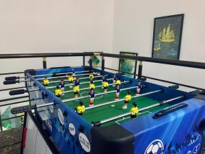 a table with a group of toy soccer players on it at Urban Haven - Orchid, Lekki in Lekki